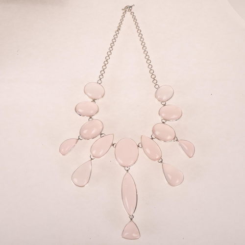 1377 - A large and impressive sterling silver rose quartz collar fringe necklace, set with vari-shape caboc... 