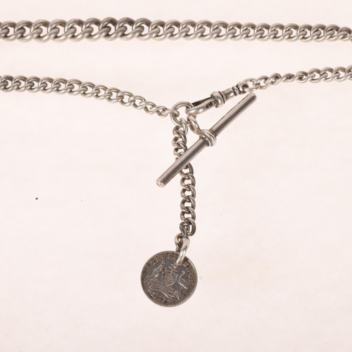 1378 - An Antique silver graduated solid curb link Albert chain necklace, with silver T-bar dog clip and th... 