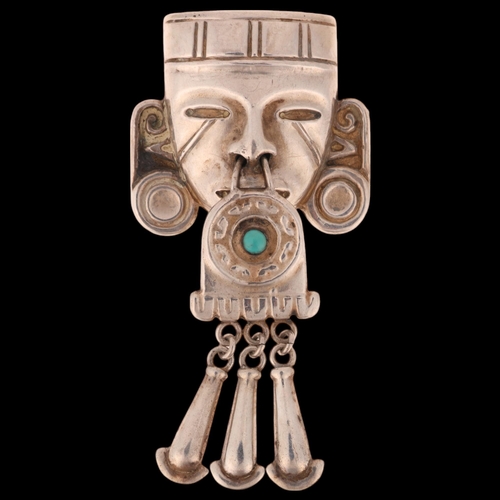 1387 - A Vintage Mexican sterling silver turquoise Aztec head brooch, with articulated drops, 78.3mm, 17.2g