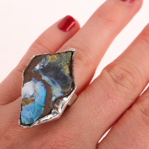 1406 - A large modernist sterling silver rough boulder opal ring, maker VSV, setting height 38.9mm, size N,... 