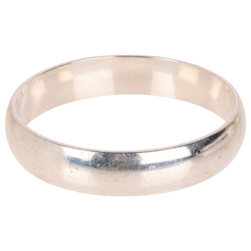 1408 - RANDERS SOLVVAREFABRIK - a heavy Danish sterling silver slave bangle, band width 14mm, internal circ... 