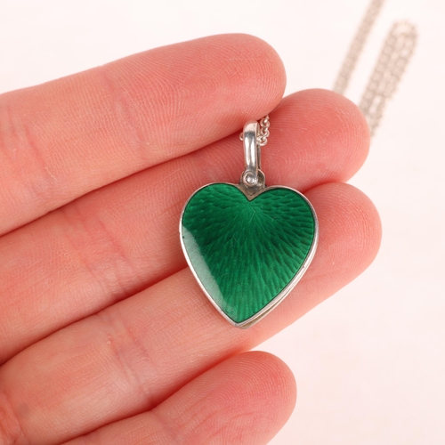 1409 - GUSTAV ADOLF SAELLSTROM - a Danish silver and green enamel sliding heart pendant necklace, on sterli... 