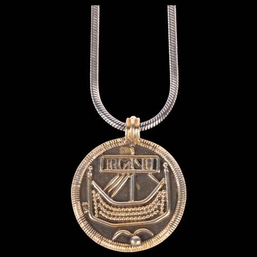 1428 - A Scandinavian sterling silver-gilt 'Kopi' Viking ship pendant necklace, on sterling snake link chai... 