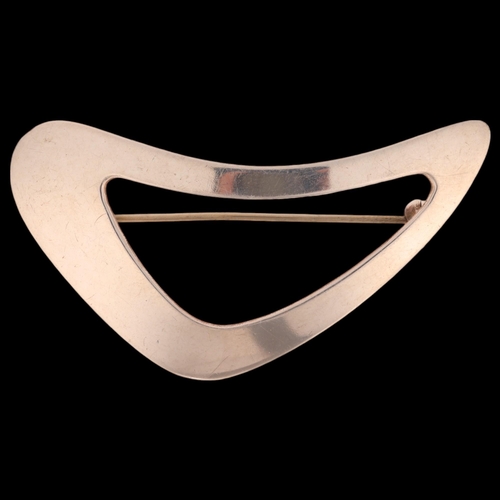 1446 - NIELS ERIK FROM - a Danish modernist sterling silver abstract brooch, plain openwork convex form, 52... 