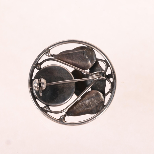 1448 - An Art Nouveau Danish sterling silver and amber floral brooch, circular openwork form, indistinct ma... 