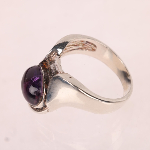 1449 - PETER ERNST RAVBUTIKKEN - a Danish modernist sterling silver amethyst ring, set with oval cabochon a... 