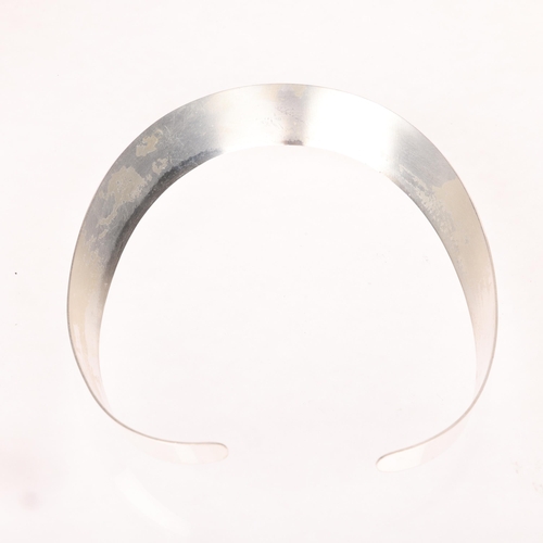 1451 - JENS JOHS AAGAARD - a Danish modernist sterling silver neck torque, of plain form, band width 16.8mm... 