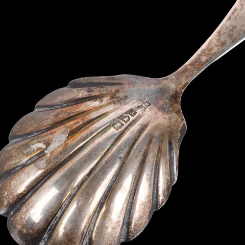 1510 - A George V silver shell tea caddy spoon, Josiah Williams & Co, London 1913, 8.5cm