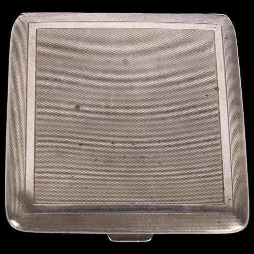 1525 - A George VI square silver cigarette case, Duncan & Scobbie, Birmingham 1947, allover engine turned d... 