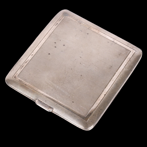 1525 - A George VI square silver cigarette case, Duncan & Scobbie, Birmingham 1947, allover engine turned d... 