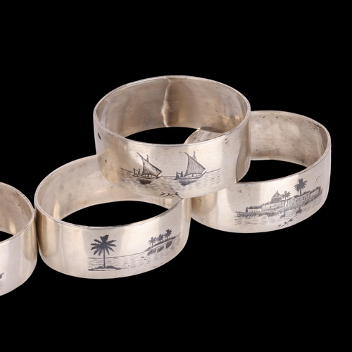 1528 - A set of 6 Iraqi silver and niello napkin rings, 5cm, 3.5oz, and a sterling silver cocktail swizzle ... 