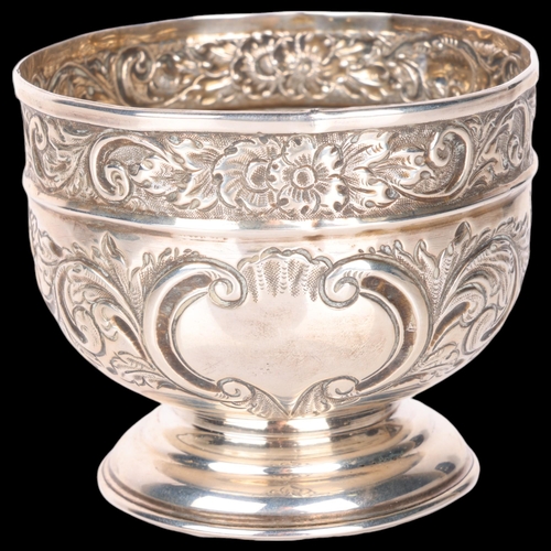 1530 - An Edwardian silver pedestal sugar bowl, Corke Brothers & Co, London 1905, circular form with relief... 