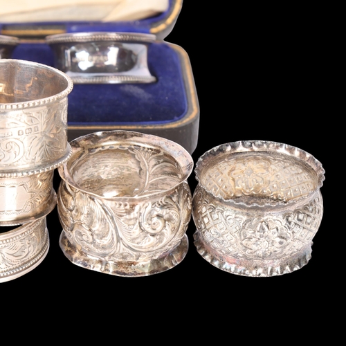 1538 - Various silver napkin rings, including cased pair, 5.2oz total