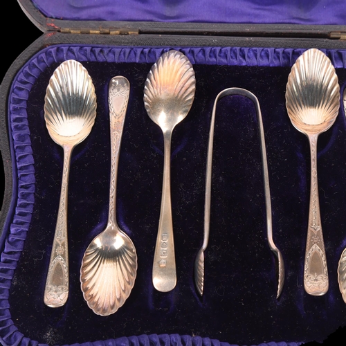 1560 - A cased set of Edwardian silver shell teaspoons and sugar tongs, Josiah Williams & Co, London 1902, ... 