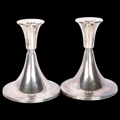 1563 - DAVID ANDERSEN - a pair of Norwegian modernist silver table candlesticks of circular tapered form, 1... 