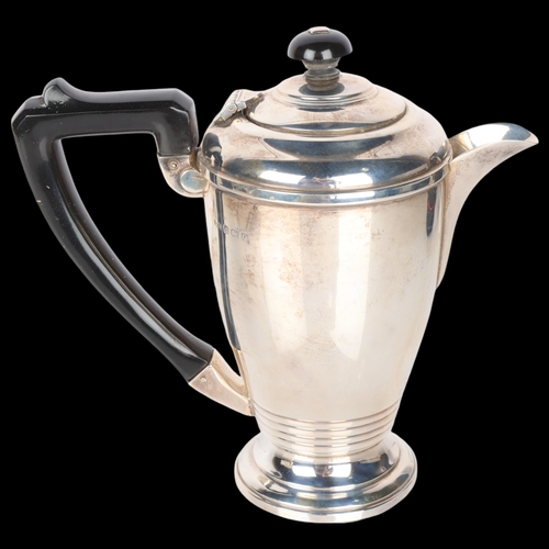 1569 - A George VI Art Deco silver hot water jug, Roberts & Dore Ltd, Birmingham 1938, cylindrical form wit... 