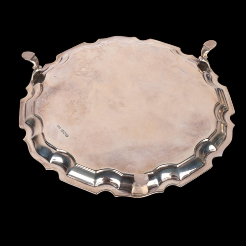 1572 - MAPPIN & WEBB - a George VI silver salver, scalloped rim raised on 3 feet, 20.5cm, 9.9oz