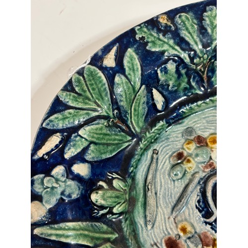 147 - 19th century Palissy style faience pottery bowl, relief lizard fish and frog decoration, in blue and... 