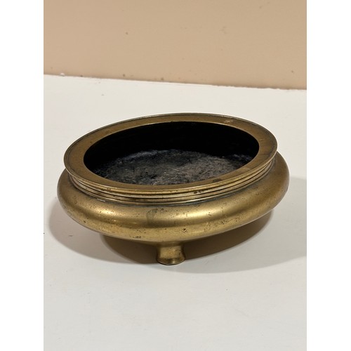 183 - A Chinese polished bronze incense burner on 3 feet, impressed 6 character mark, rim diameter 14cm, h... 