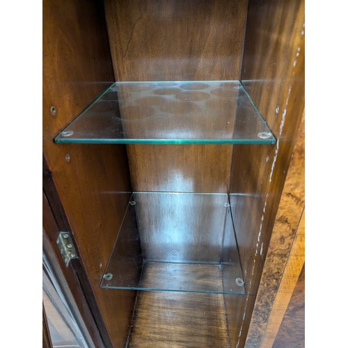 2513 - A modern Art Deco style burr walnut veneered drinks cabinet. W133cm, H114cm, D40cm.