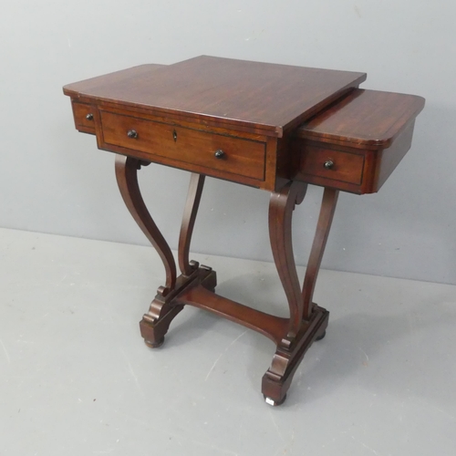 2525 - A 19th century Regency mahogany and ebony inlaid ladies’ writing table with adjustable top and three... 