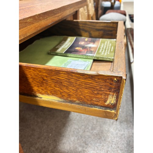 588 - An Arts and Crafts oak desk, attributed to L & J.G.Stickley, New York, with integral book shelves to... 