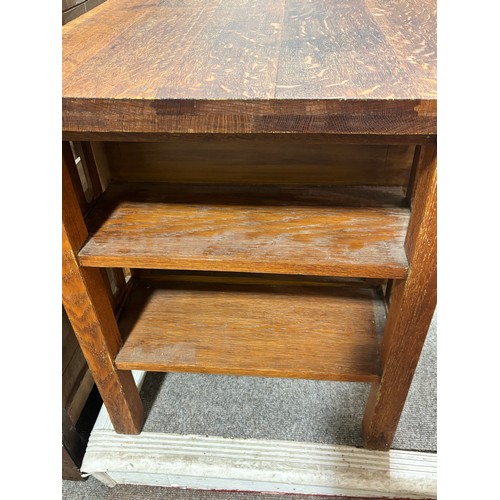 588 - An Arts and Crafts oak desk, attributed to L & J.G.Stickley, New York, with integral book shelves to... 