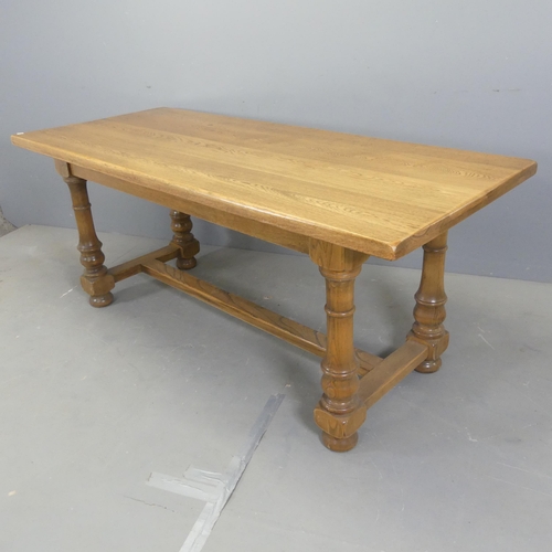 2549 - A modern oak dining table in the 19th century manner, with turned legs and H-shaped stretcher. W182c... 