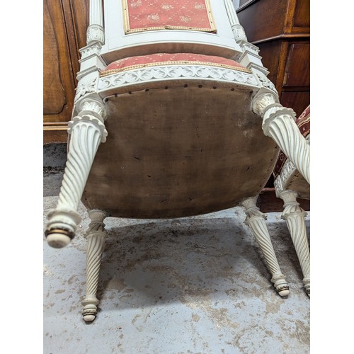 2551 - A set of three French bedroom / side chairs, with carved and painted wooden frames and upholstered s... 