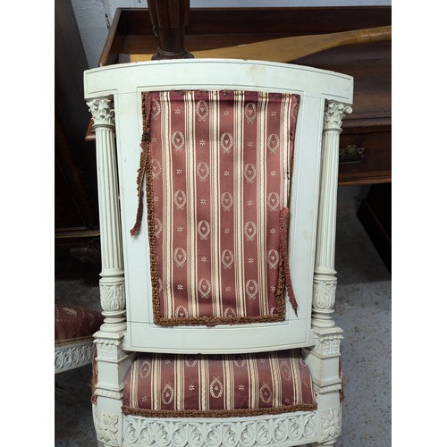 2551 - A set of three French bedroom / side chairs, with carved and painted wooden frames and upholstered s... 