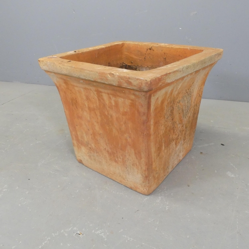 2612 - A square terracotta garden planter, with shell design handles. W37cm, H32cm.