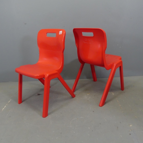 2632 - A set of four Remploy stacking chairs, and a set of three Titan stacking chairs.... 