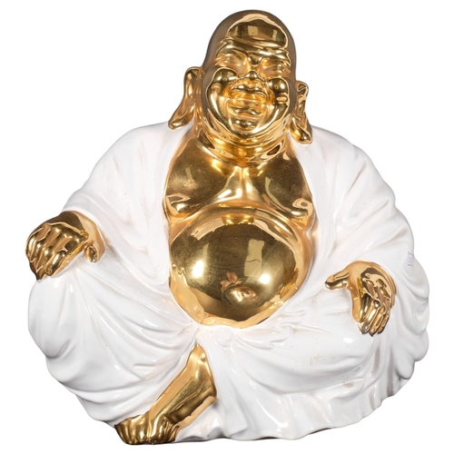 237 - A white glazed gold-finished ceramic seated Buddha, H29cm