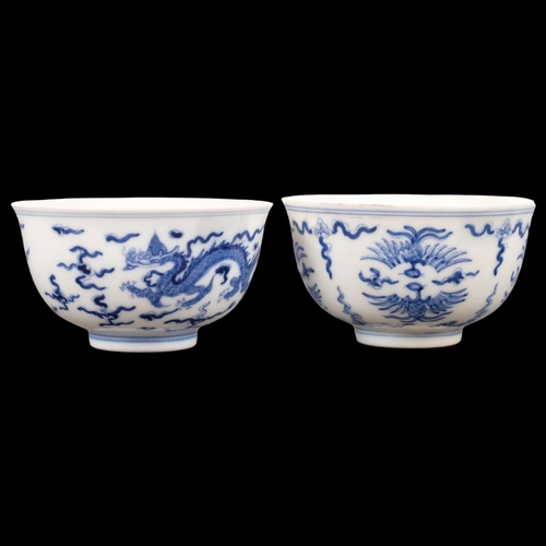 243 - 2 Chinese blue and white tea bowls, both with 6 character marks on bases, diameter 8cm