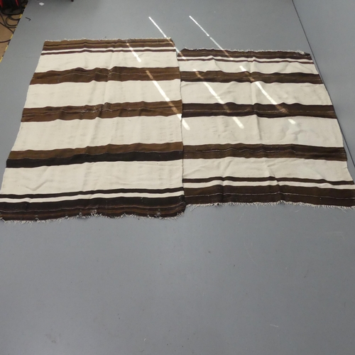 2303 - Two striped wool rugs. Largest 166x106cm.