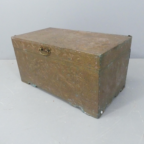 2740 - An early 20th century oriental style copper-clad chest, with repousse decoration and felt lining. W7... 