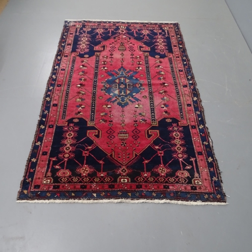 2299 - A mid-20th century Caucasus Shirvan red and blue ground wool rug, 185 x 115cm