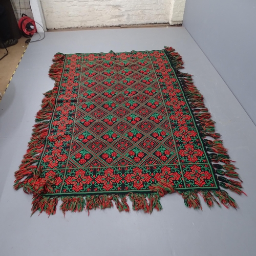 2311 - A Mid-century Reginal Italian Throw, decorated with red  roses and fringed edge, 134 x 224cm