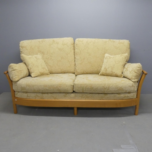 2500 - ERCOL - A Renaissance two seater sofa. Overall width 192cm, height 100cm, depth 92cm.... 