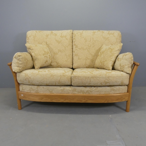 2501 - ERCOL - A Renaissance two seater sofa. Overall width 153cm, height 100cm, depth 92cm.... 