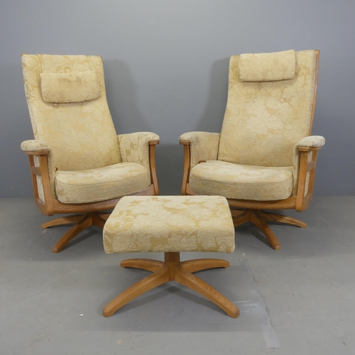 2502 - ERCOL - A pair of Gina reclining swivel arm chairs, with matching footstool.... 