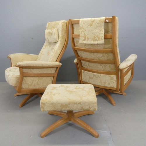 2502 - ERCOL - A pair of Gina reclining swivel arm chairs, with matching footstool.... 