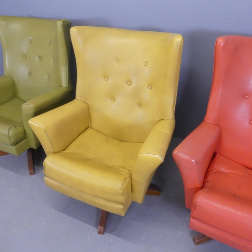 2505 - Three mid-century style rexine swivel lounge chairs.