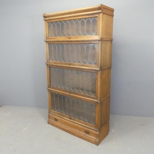 2511 - WITHDRAWN - An early 20th century oak Globe Wernicke four shelf sectional stacking bookcase, in six ... 