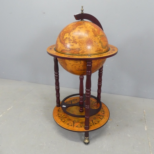 2517 - A reproduction globe-design drinks cabinet. Diameter 45cm, height 92cm.