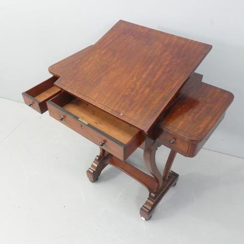 2525 - A 19th century Regency mahogany and ebony inlaid ladies’ writing table with adjustable top and three... 