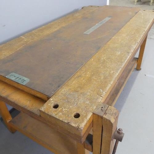 2535 - A vintage Japanese two-tier work bench, with sliding metal topped centre panel and fitted vice. W180... 