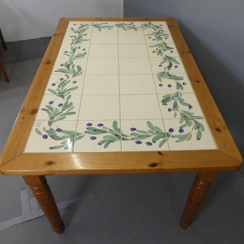 2548 - NICOLA FASANO - An Italian modern pine dining table with inset painted tile top, signed. W160cm, H76... 