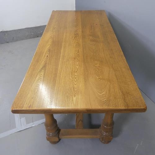 2549 - A modern oak dining table in the 19th century manner, with turned legs and H-shaped stretcher. W182c... 