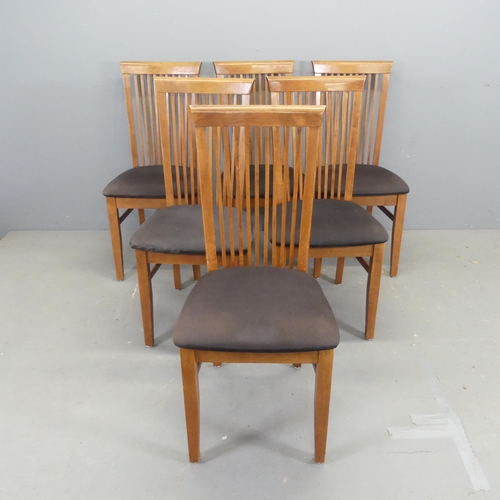 2550 - A set of six modern mahogany and faux-leather upholstered dining chairs.